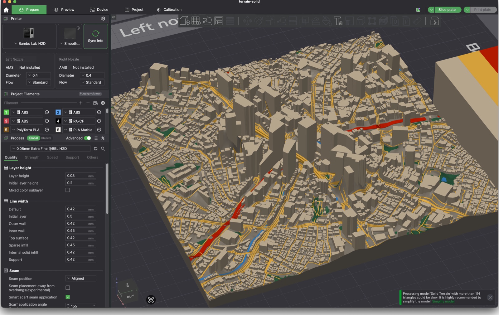 Angled view of the Shibuya Station terrain model in Bambu Studio, showing dense buildings, roads, rail lines, and water